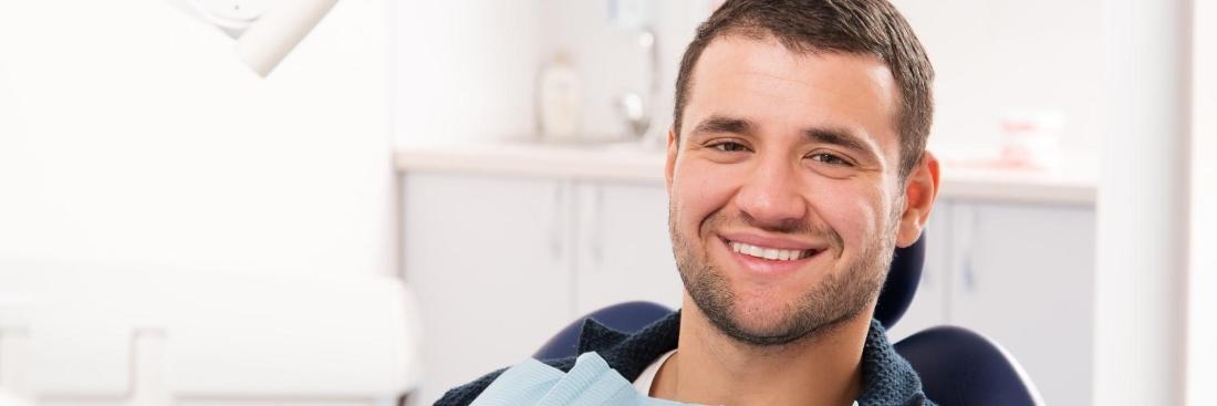 Man smiling in dental chair | sedation dentistry fontana ca