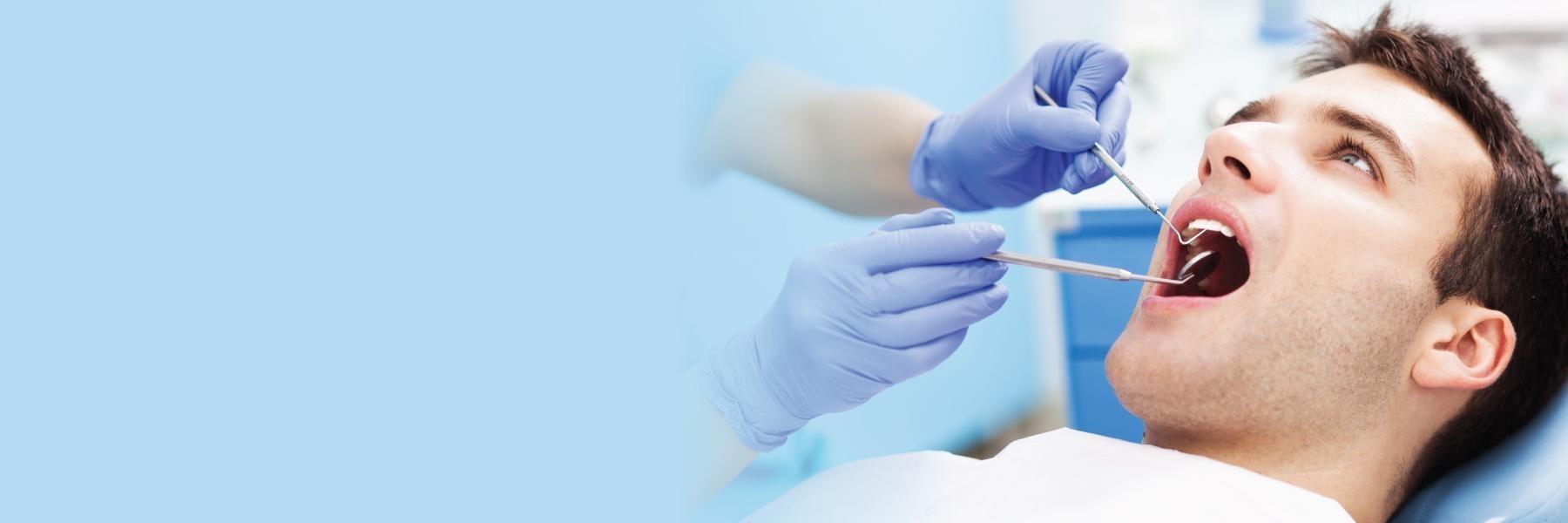 man getting dental work | Dentist fontana ca