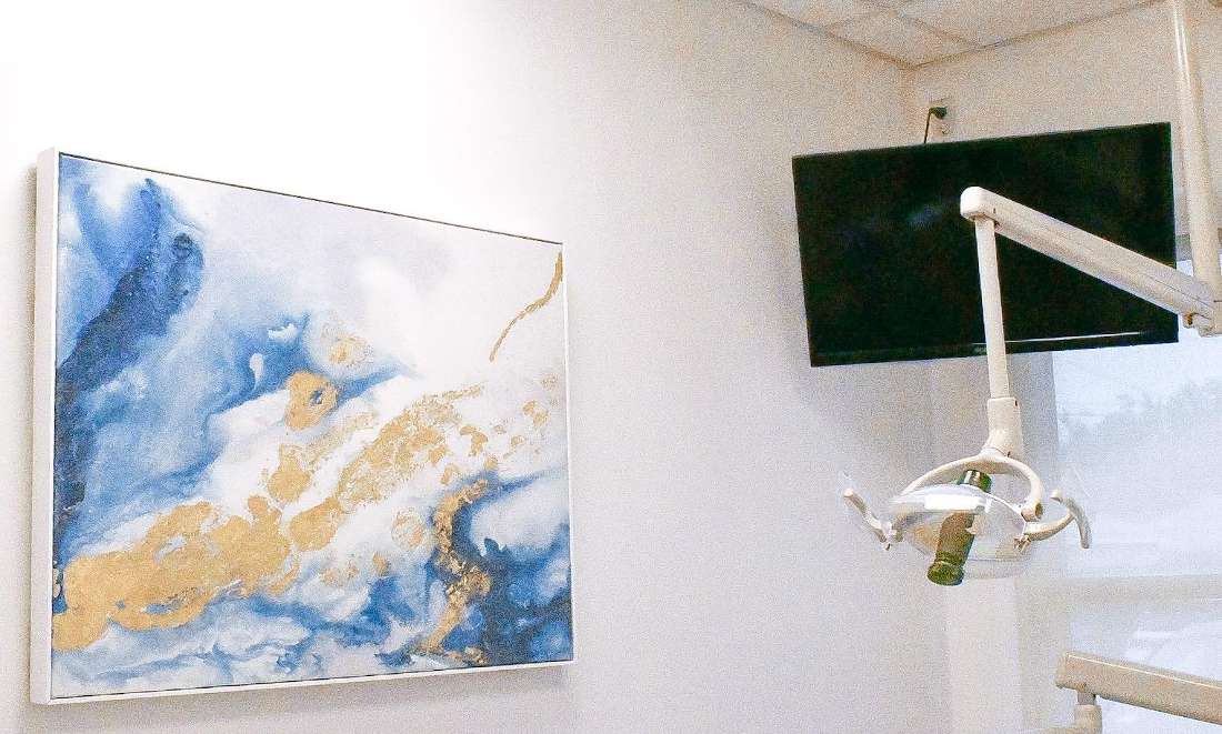 Treatment Room with TV at winningsmiles custom dentistry & implant center, fontana ca